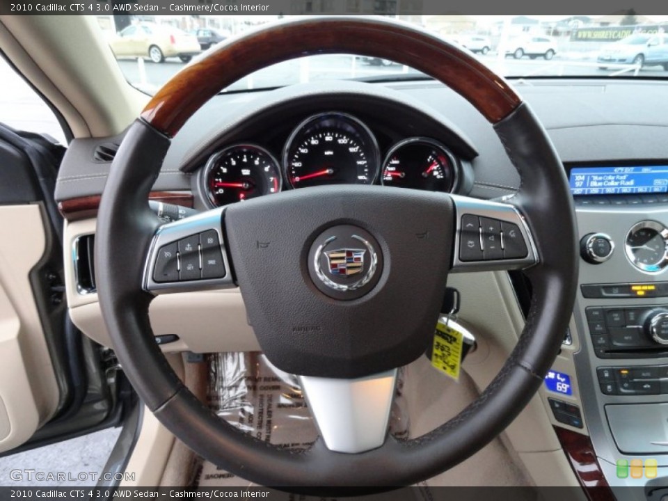 Cashmere/Cocoa Interior Steering Wheel for the 2010 Cadillac CTS 4 3.0 AWD Sedan #77808237