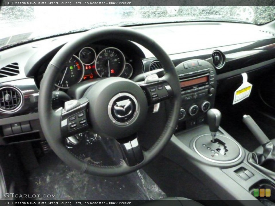 Black Interior Dashboard for the 2013 Mazda MX-5 Miata Grand Touring Hard Top Roadster #77812970