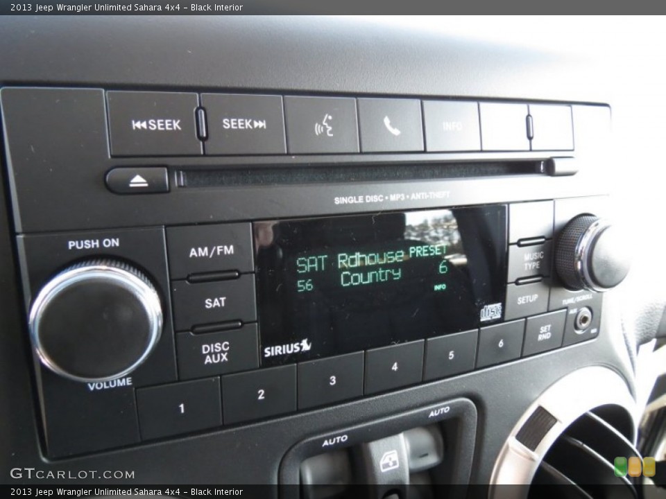 Black Interior Audio System for the 2013 Jeep Wrangler Unlimited Sahara 4x4 #77813041
