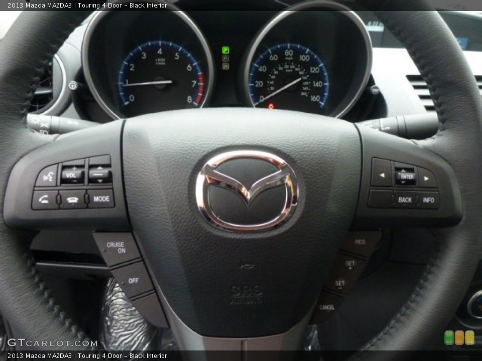 Black Interior Steering Wheel for the 2013 Mazda MAZDA3 i Touring 4 Door #77813351