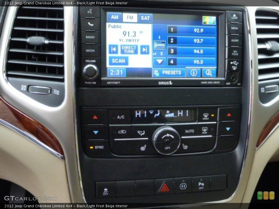 Black/Light Frost Beige Interior Controls for the 2012 Jeep Grand Cherokee Limited 4x4 #77815571