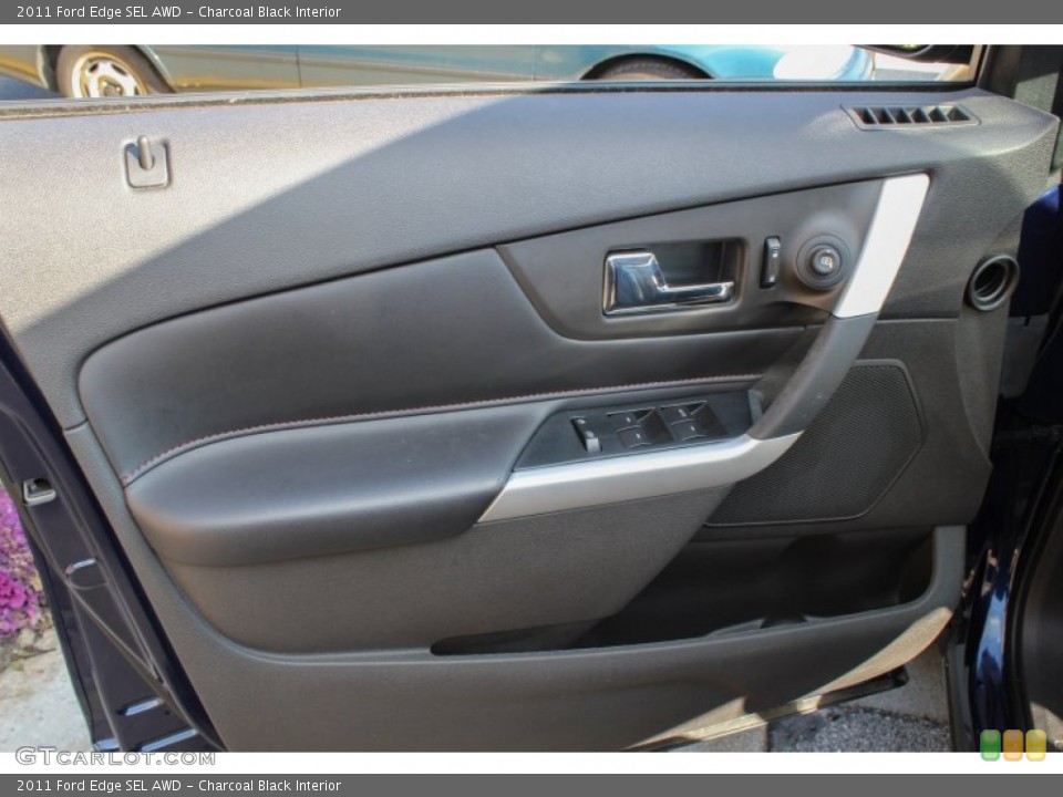 Charcoal Black Interior Door Panel for the 2011 Ford Edge SEL AWD #77829538