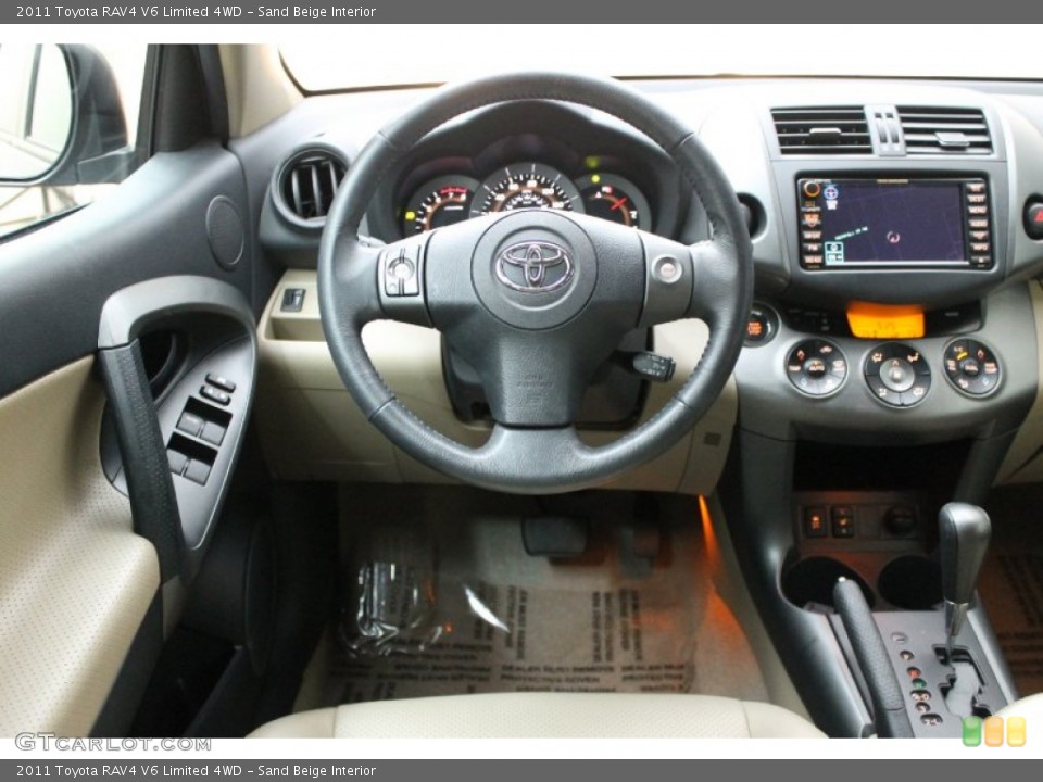 Sand Beige Interior Dashboard for the 2011 Toyota RAV4 V6 Limited 4WD #77840448