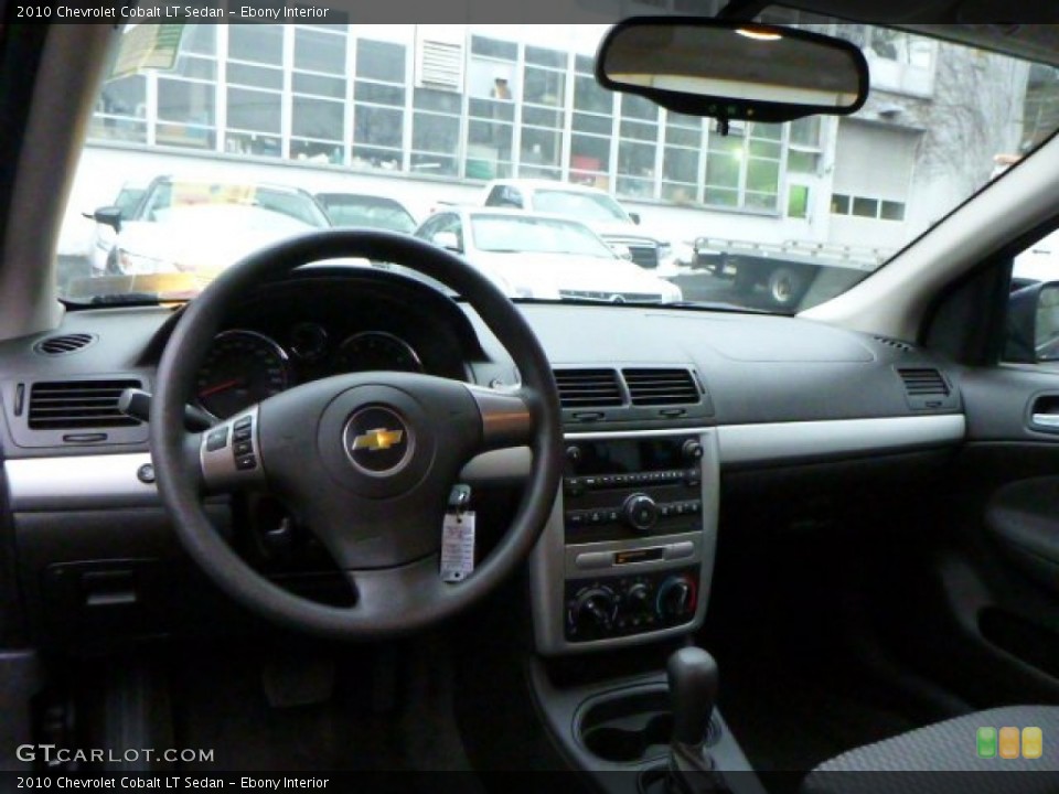 Ebony Interior Dashboard for the 2010 Chevrolet Cobalt LT Sedan #77859476