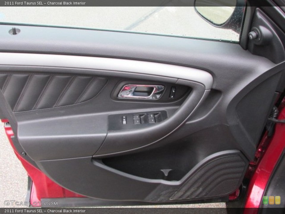 Charcoal Black Interior Door Panel for the 2011 Ford Taurus SEL #77859708