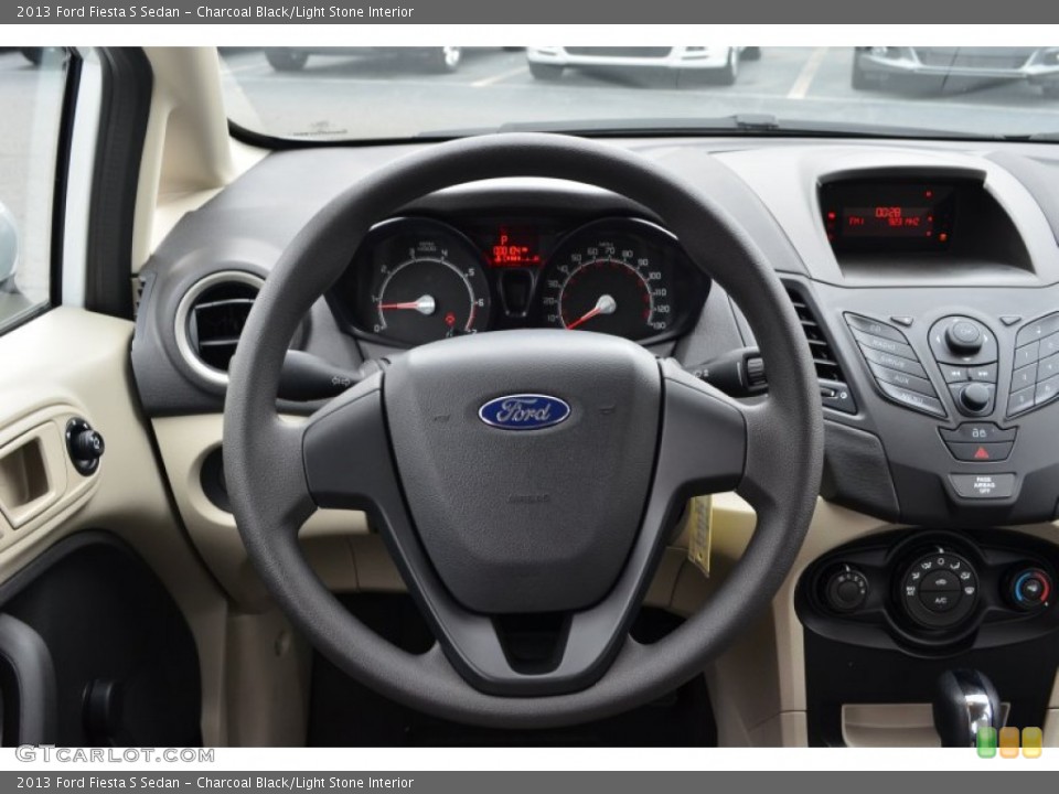 Charcoal Black/Light Stone Interior Steering Wheel for the 2013 Ford Fiesta S Sedan #77862173