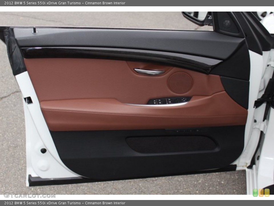 Cinnamon Brown Interior Door Panel for the 2012 BMW 5 Series 550i xDrive Gran Turismo #77869806