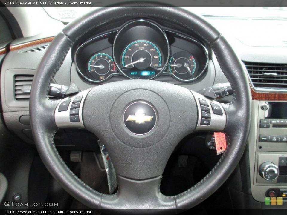 Ebony Interior Steering Wheel for the 2010 Chevrolet Malibu LTZ Sedan #77872863