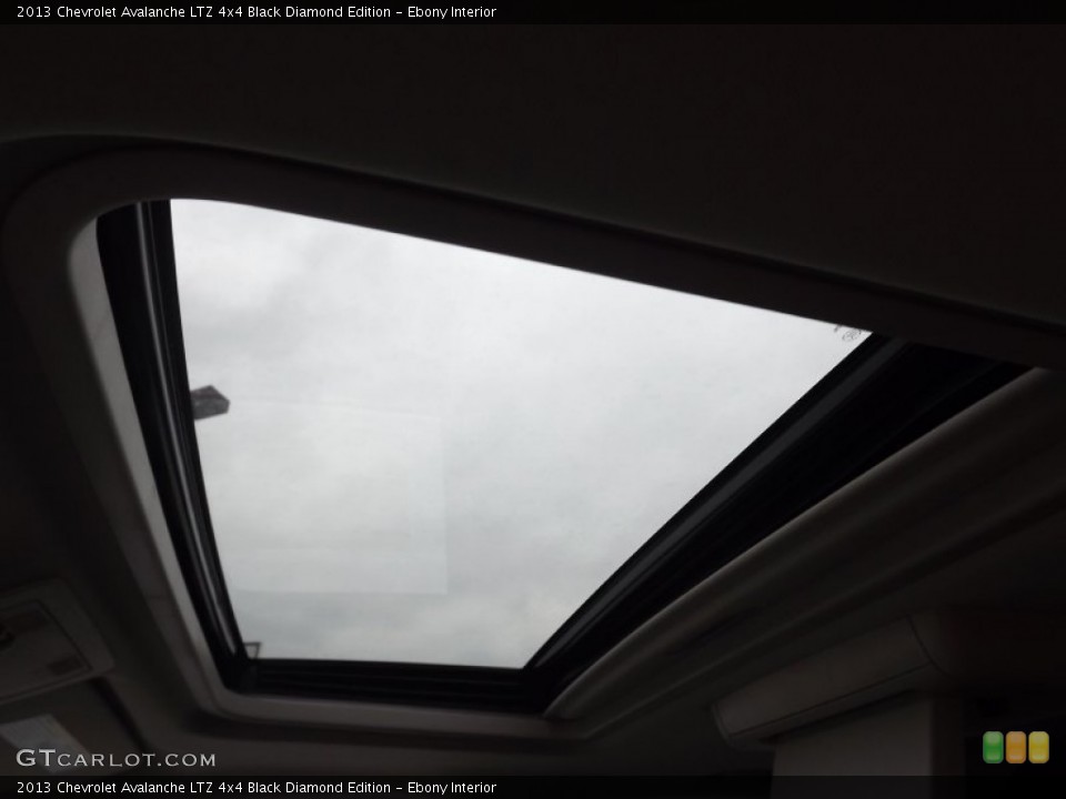 Ebony Interior Sunroof for the 2013 Chevrolet Avalanche LTZ 4x4 Black Diamond Edition #77887086