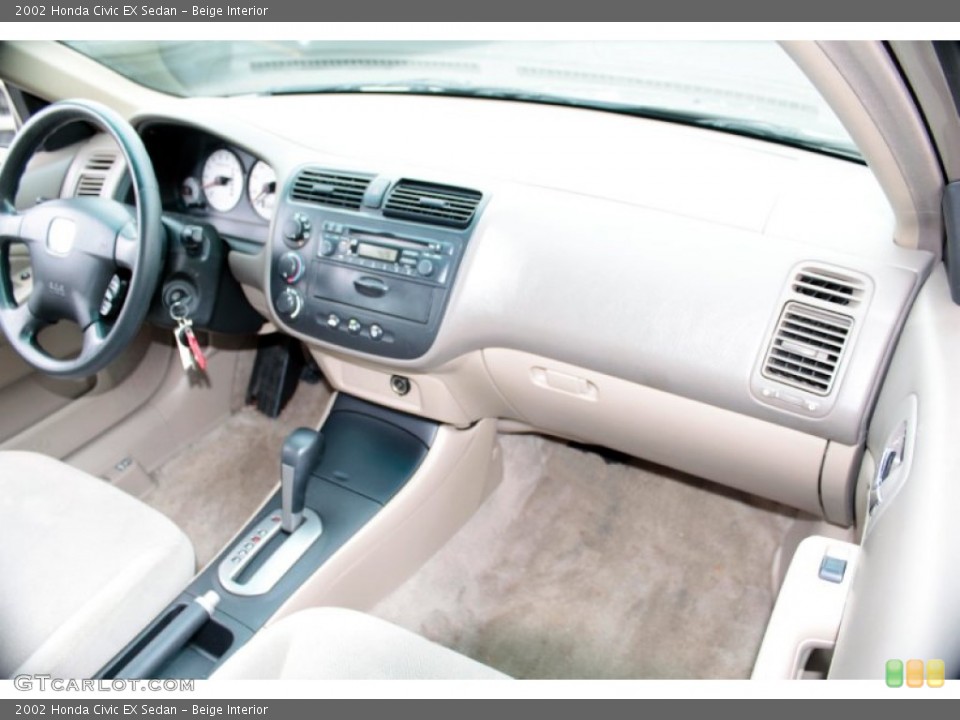 Beige Interior Dashboard for the 2002 Honda Civic EX Sedan #77899009