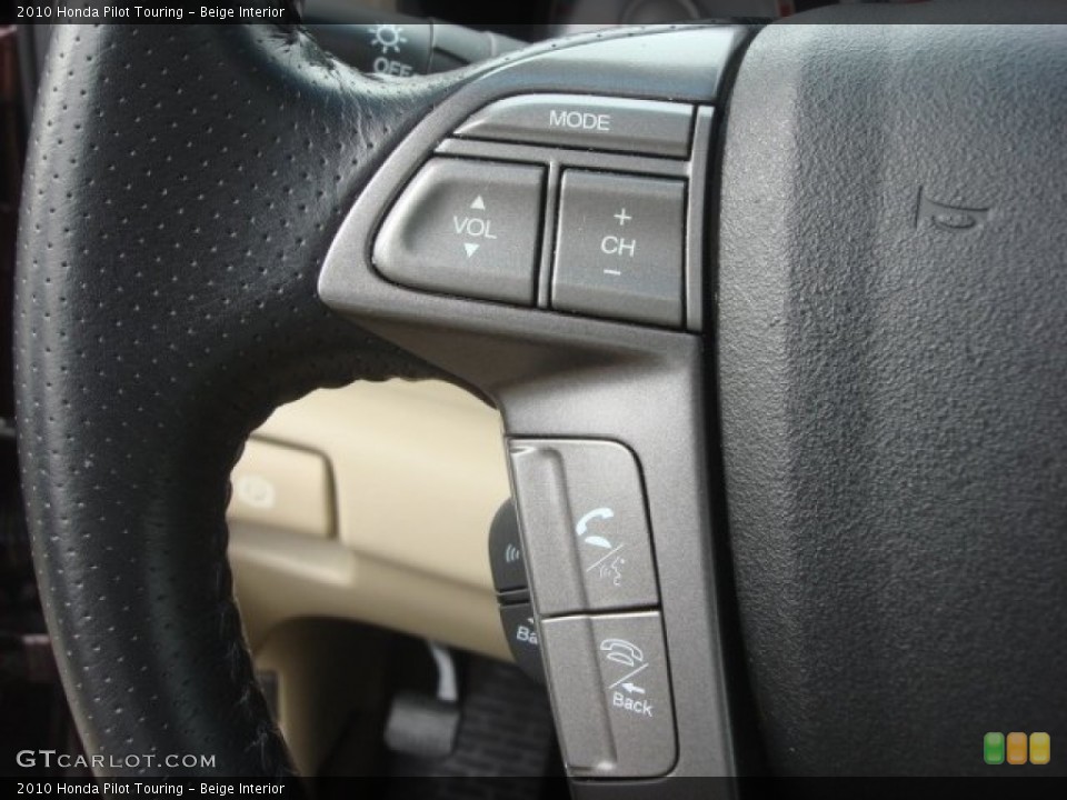 Beige Interior Controls for the 2010 Honda Pilot Touring #77906092