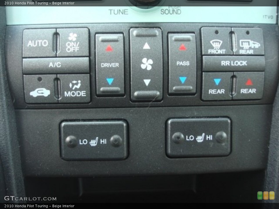 Beige Interior Controls for the 2010 Honda Pilot Touring #77906167