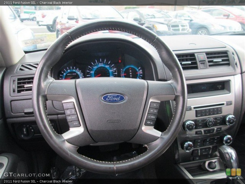 Charcoal Black Interior Steering Wheel for the 2011 Ford Fusion SEL #77909064