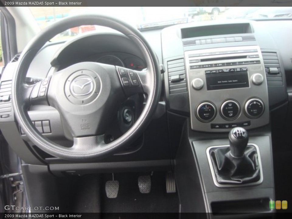 Black Interior Dashboard for the 2009 Mazda MAZDA5 Sport #77915050