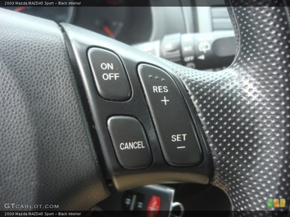 Black Interior Controls for the 2009 Mazda MAZDA5 Sport #77915164