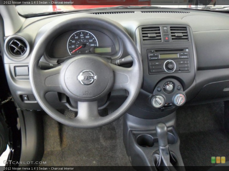 Charcoal Interior Dashboard for the 2012 Nissan Versa 1.6 S Sedan #77920129