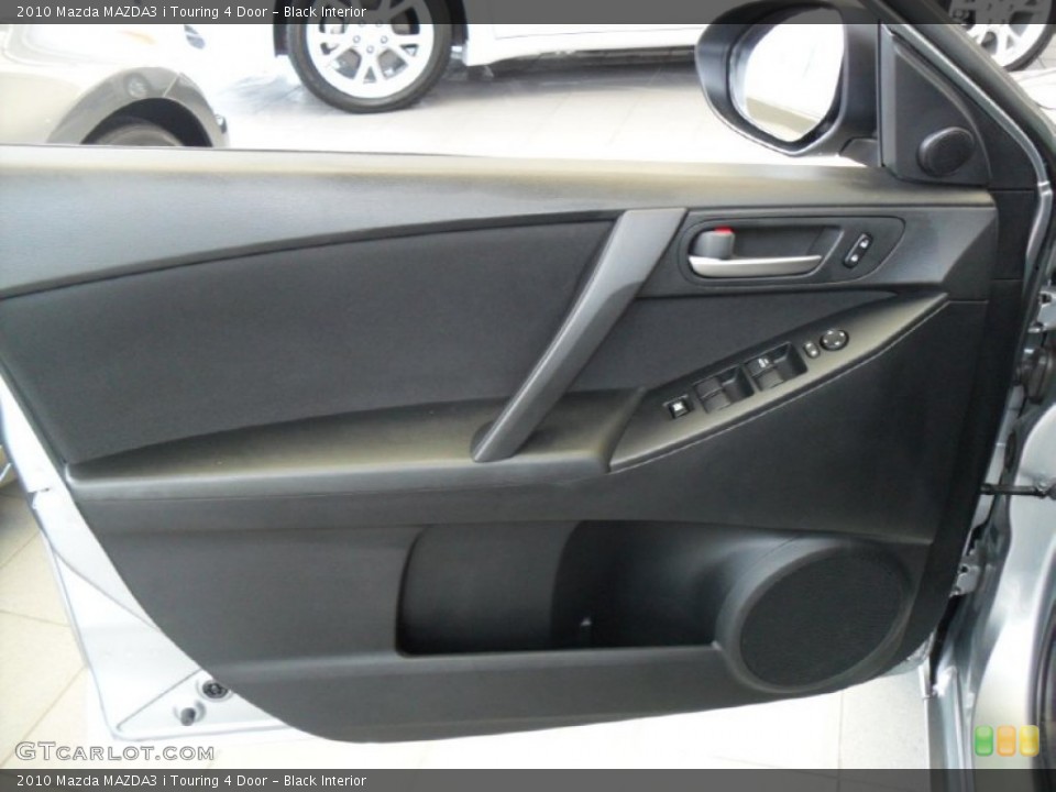 Black Interior Door Panel for the 2010 Mazda MAZDA3 i Touring 4 Door #77920541