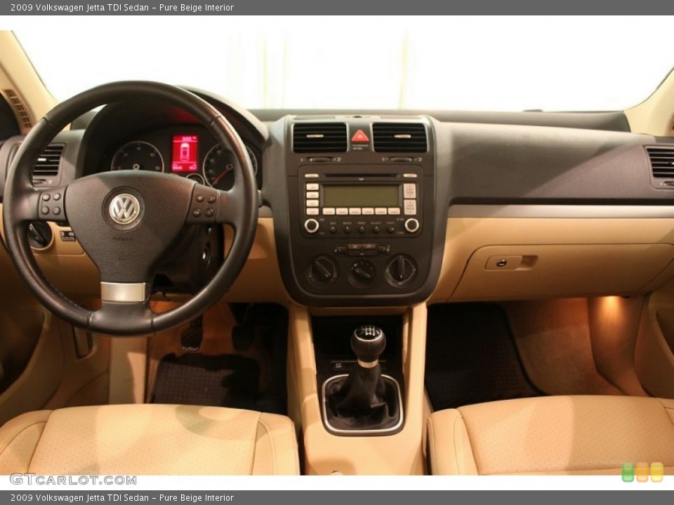 Pure Beige Interior Dashboard for the 2009 Volkswagen Jetta TDI Sedan #77927262