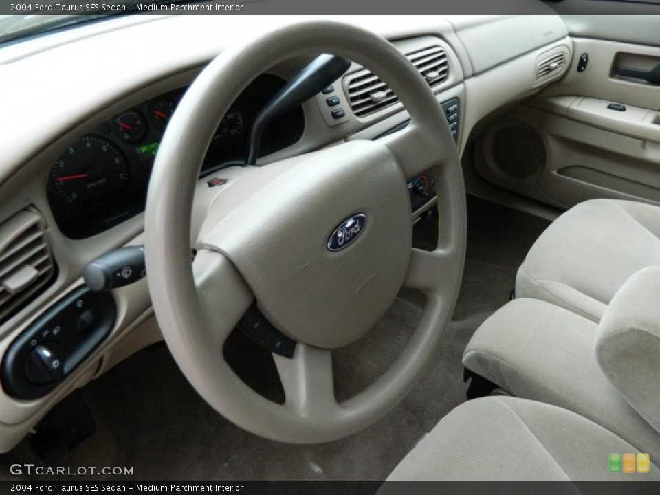 Medium Parchment Interior Steering Wheel for the 2004 Ford Taurus SES Sedan #77928311