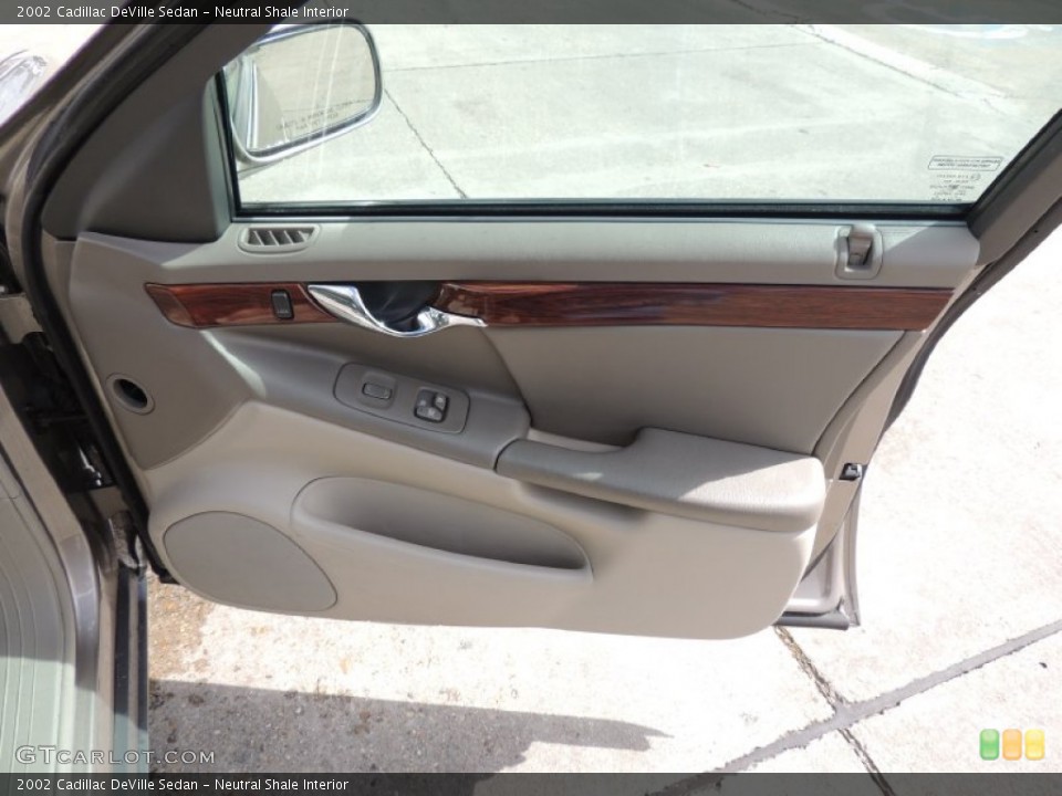 Neutral Shale Interior Door Panel for the 2002 Cadillac DeVille Sedan #77940902