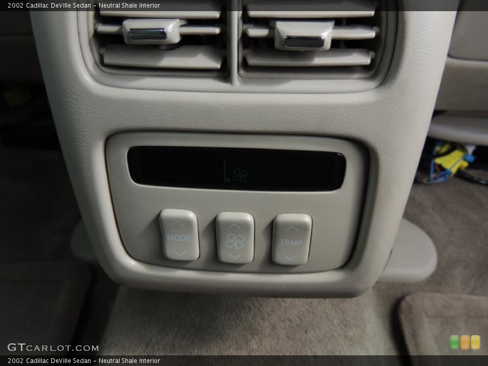 Neutral Shale Interior Controls for the 2002 Cadillac DeVille Sedan #77940963
