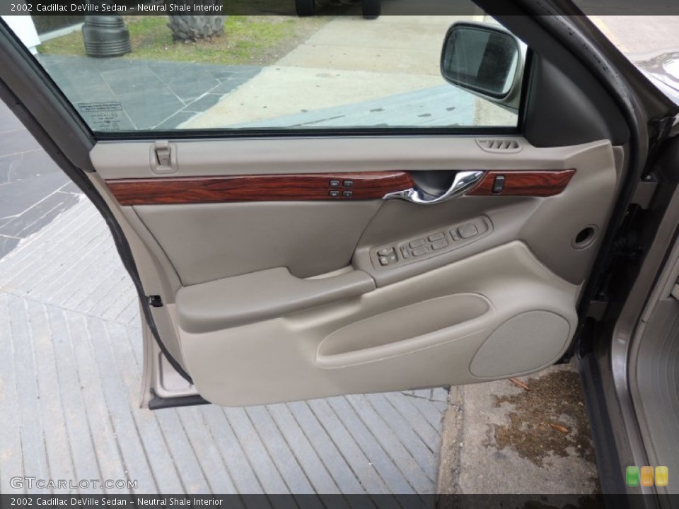 Neutral Shale Interior Door Panel for the 2002 Cadillac DeVille Sedan #77941080