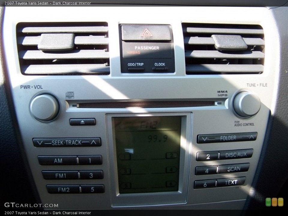 Dark Charcoal Interior Controls for the 2007 Toyota Yaris Sedan #77957167