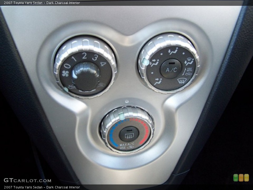 Dark Charcoal Interior Controls for the 2007 Toyota Yaris Sedan #77957178