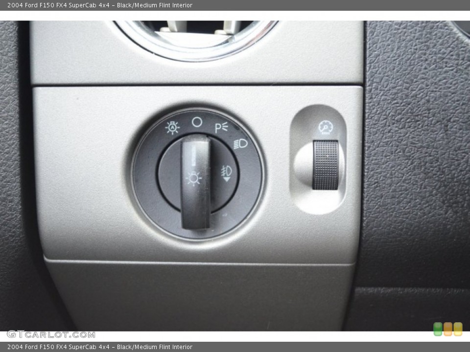 Black/Medium Flint Interior Controls for the 2004 Ford F150 FX4 SuperCab 4x4 #77962799