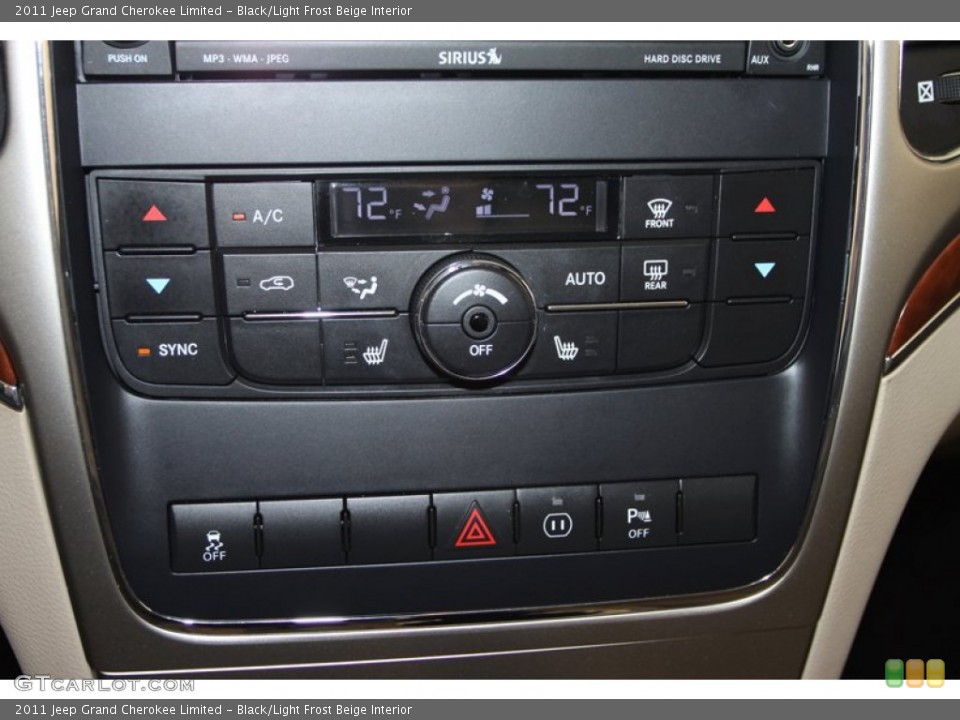 Black/Light Frost Beige Interior Controls for the 2011 Jeep Grand Cherokee Limited #78024391
