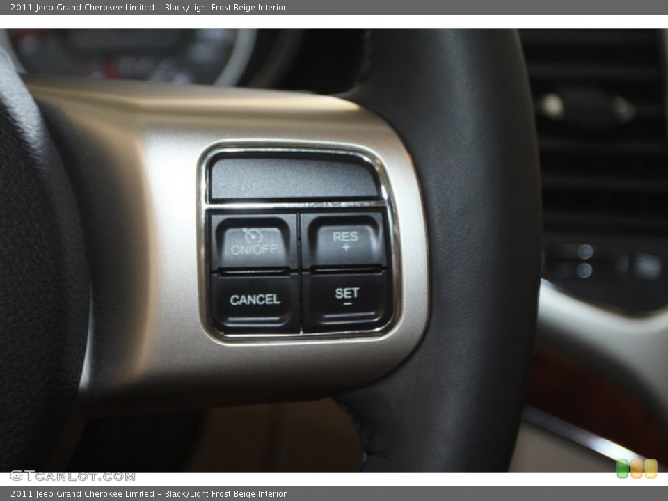 Black/Light Frost Beige Interior Controls for the 2011 Jeep Grand Cherokee Limited #78024488