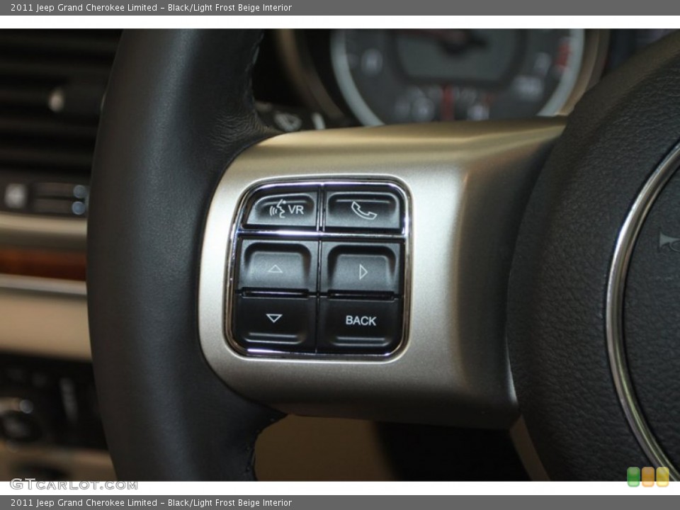 Black/Light Frost Beige Interior Controls for the 2011 Jeep Grand Cherokee Limited #78024507