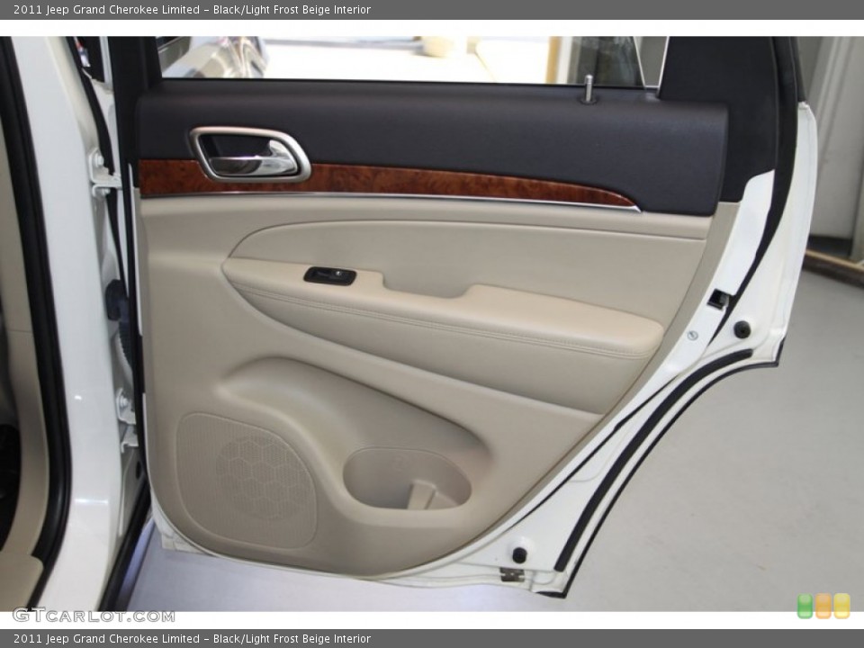 Black/Light Frost Beige Interior Door Panel for the 2011 Jeep Grand Cherokee Limited #78024699