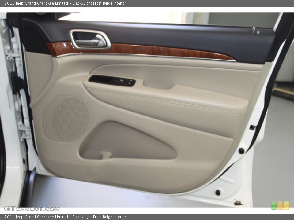 Black/Light Frost Beige Interior Door Panel for the 2011 Jeep Grand Cherokee Limited #78024717
