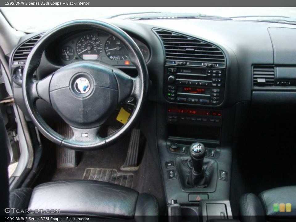 Black Interior Dashboard for the 1999 BMW 3 Series 328i Coupe #78054276