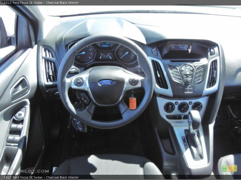 Charcoal Black Interior Dashboard for the 2012 Ford Focus SE Sedan #78072876