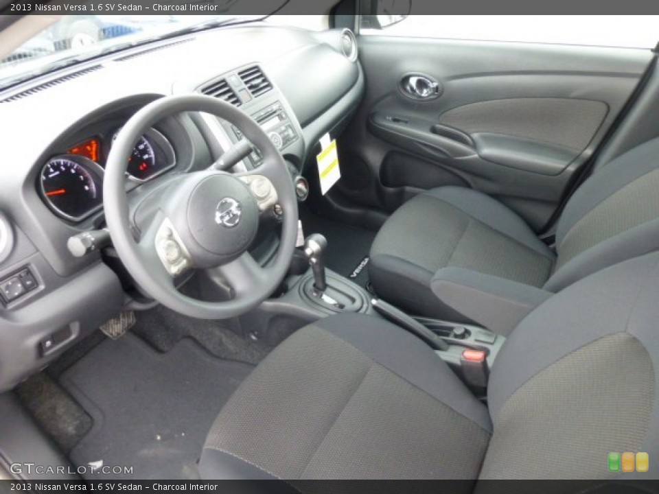 Charcoal Interior Prime Interior for the 2013 Nissan Versa 1.6 SV Sedan #78085037