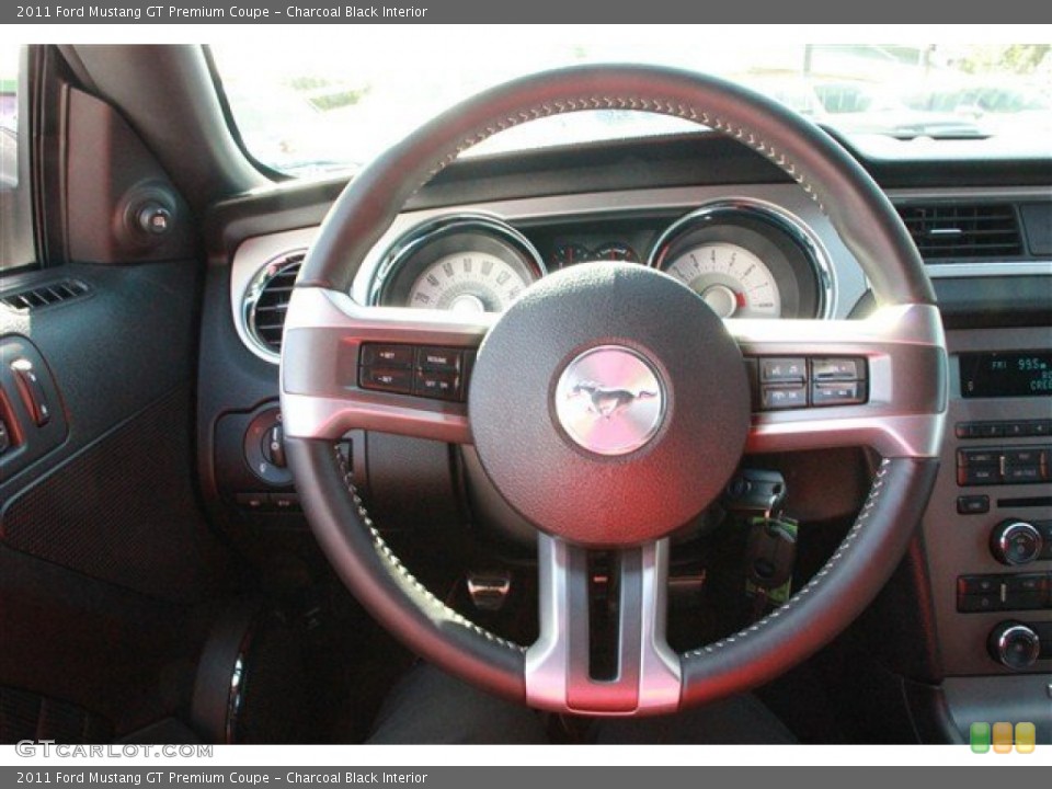 Charcoal Black Interior Steering Wheel for the 2011 Ford Mustang GT Premium Coupe #78089962