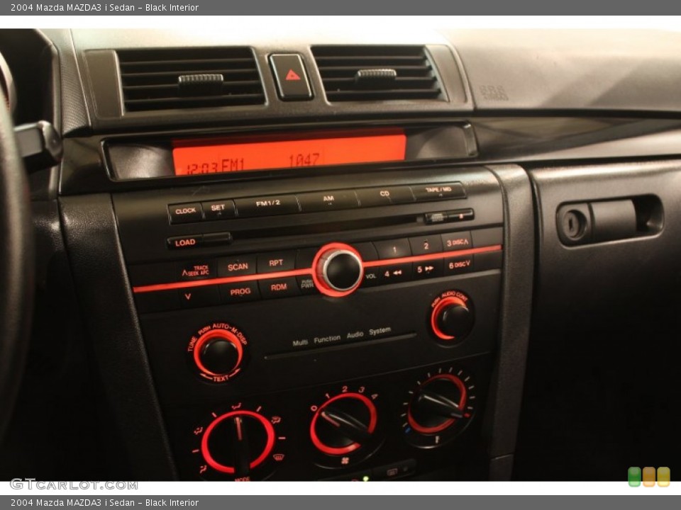Black Interior Controls for the 2004 Mazda MAZDA3 i Sedan #78108989