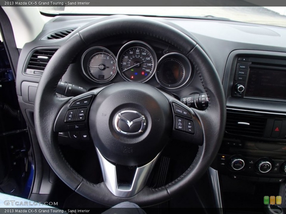 Sand Interior Steering Wheel for the 2013 Mazda CX-5 Grand Touring #78149306