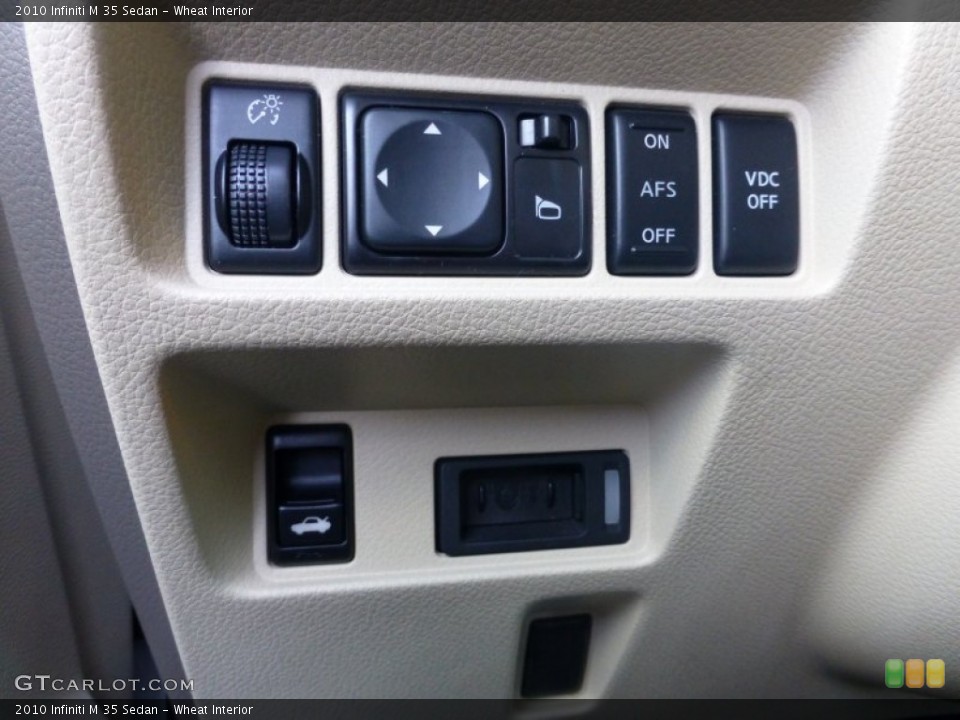 Wheat Interior Controls for the 2010 Infiniti M 35 Sedan #78153555