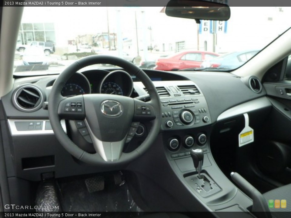 Black Interior Dashboard for the 2013 Mazda MAZDA3 i Touring 5 Door #78161376