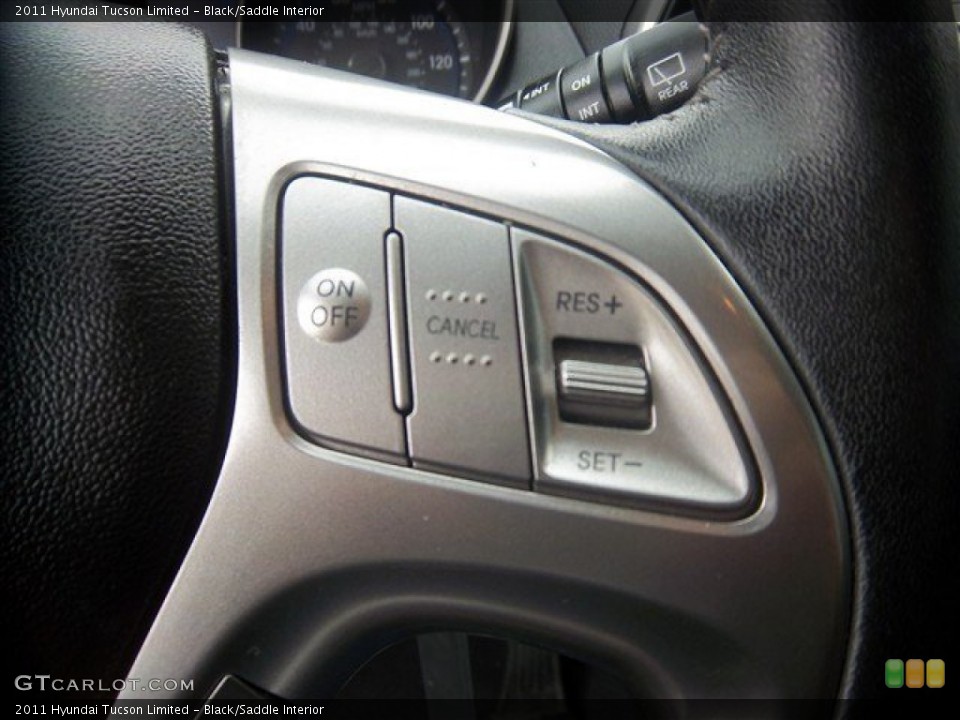 Black/Saddle Interior Controls for the 2011 Hyundai Tucson Limited #78166960