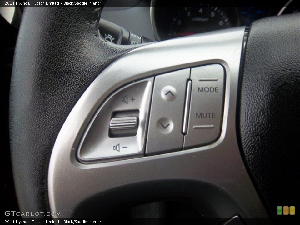 Black/Saddle Interior Controls for the 2011 Hyundai Tucson Limited #78166995