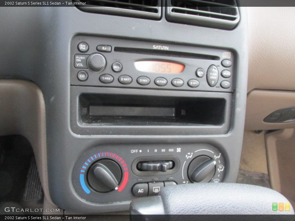 Tan Interior Controls for the 2002 Saturn S Series SL1 Sedan #78177016
