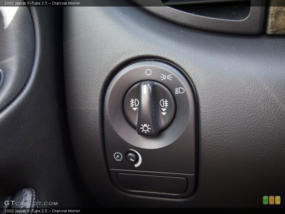Charcoal Interior Controls for the 2002 Jaguar X-Type 2.5 #78188432