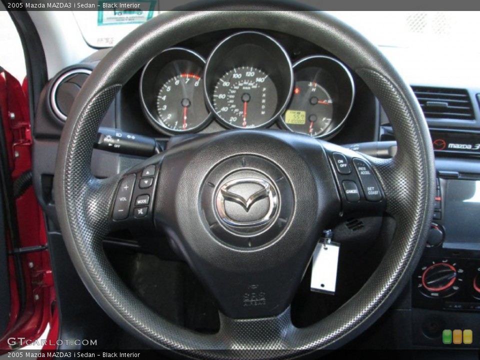 Black Interior Steering Wheel for the 2005 Mazda MAZDA3 i Sedan #78189057
