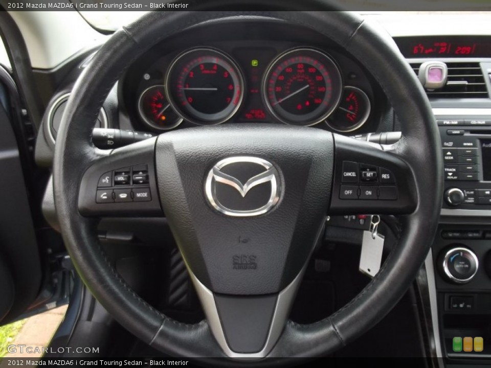 Black Interior Steering Wheel for the 2012 Mazda MAZDA6 i Grand Touring Sedan #78198630