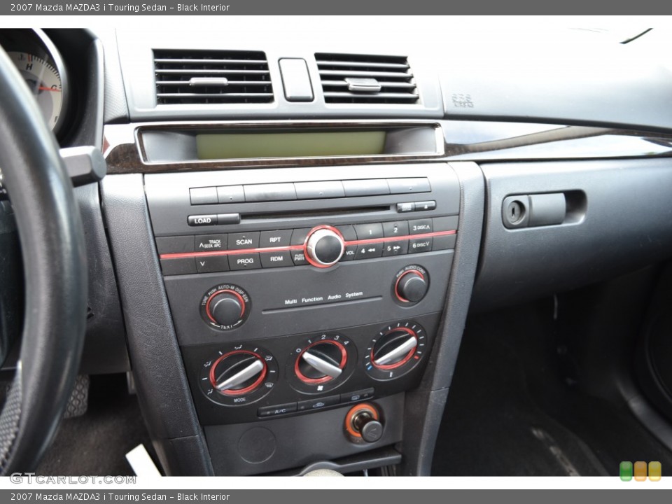 Black Interior Controls for the 2007 Mazda MAZDA3 i Touring Sedan #78207898