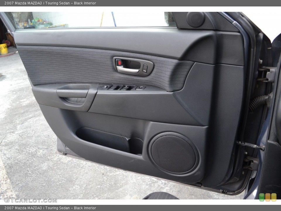 Black Interior Door Panel for the 2007 Mazda MAZDA3 i Touring Sedan #78208113